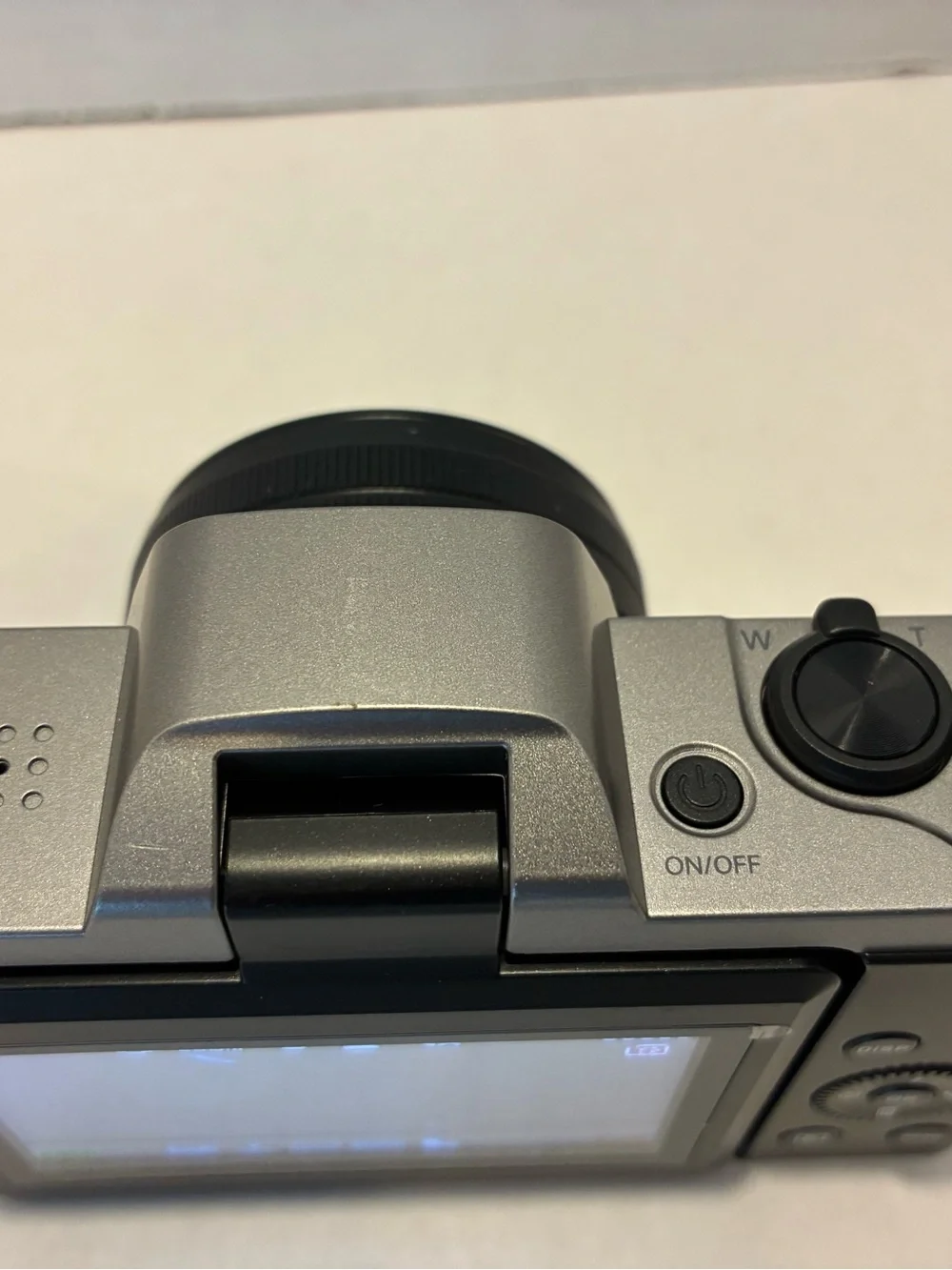 Compact Black and Silver Digital Camera with Auto Focus